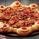 Illustration for article titled Pizza Hut Unleashes Meatstrosity on Unsuspecting Continent